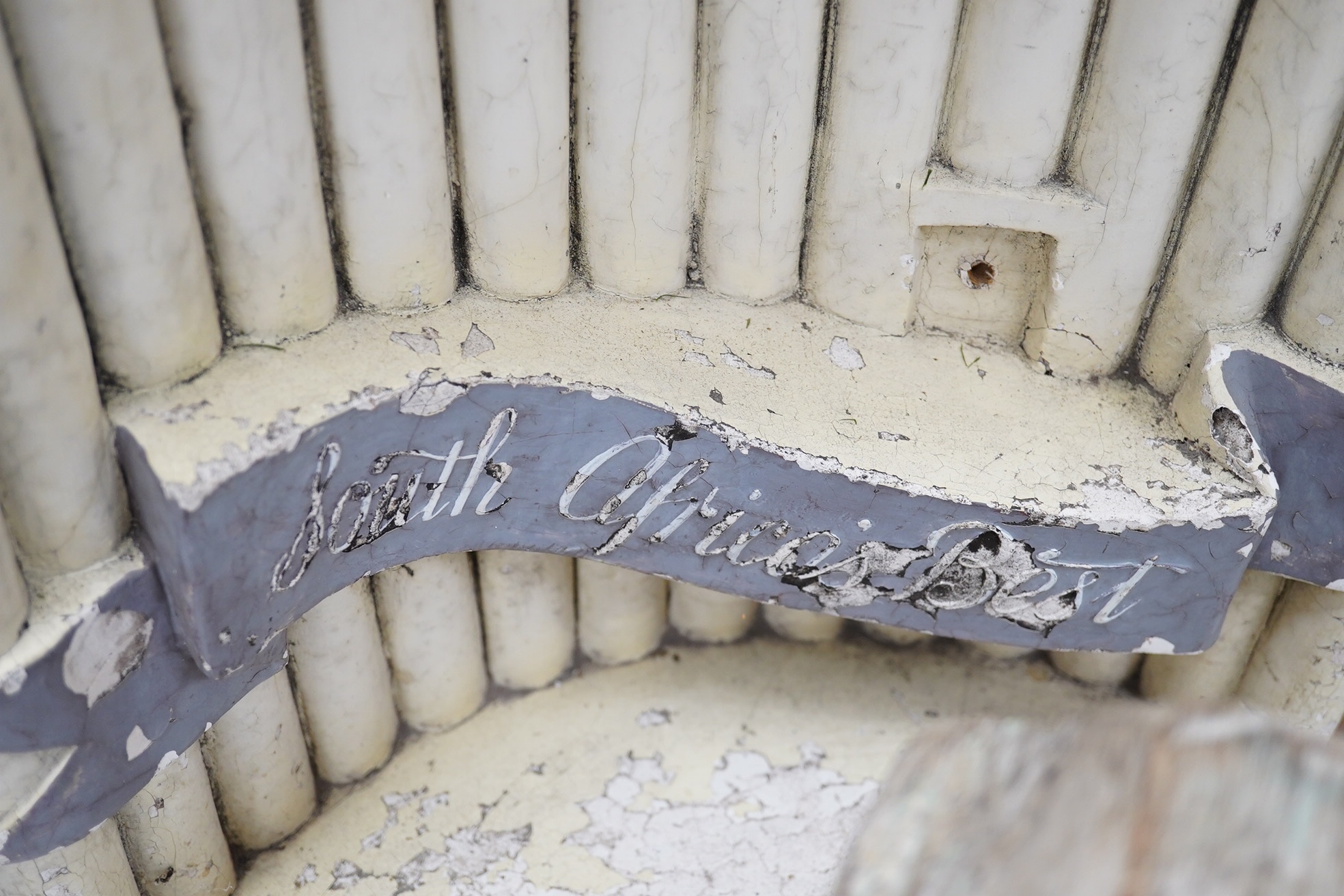 A sherry advertising niche, a wall mirror and carved capital, advertising niche 56cm high. Condition - poor